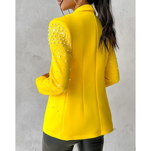 Back view of the Adrienne pearl detail blazer in Yellow