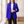 Adrienne pearl detail blazer in Blue worn open by a window