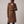 Agathe long double breasted coat in Brown on a light gray studio backdrop