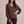Annabel cashmere V neck sweater in Brown on a light gray studio backdrop