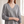 Annabel cashmere V neck sweater in Gray showing the wide ribbed V neckline