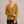 Annabel cashmere V neck sweater in Mustard on a light gray studio backdrop