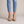 Beatrice suede ankle boots in Beige seen from the front on a light gray studio backdrop