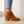 Beatrice suede ankle boots in Cognac, close view of the side zip and stacked block heel