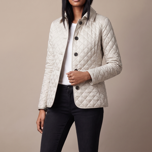 Belinda quilted jacket in White on a light gray studio backdrop