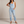 Bianca denim overalls in Light Blue on a light gray studio backdrop