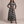 Capucine plaid maxi shirt dress in Black on a light gray studio backdrop