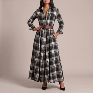 Capucine plaid maxi shirt dress in Black on a light gray studio backdrop