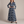 Capucine plaid maxi shirt dress in Blue on a light gray studio backdrop
