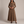 Capucine plaid maxi shirt dress in Brown on a light gray studio backdrop