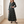 Capucine plaid maxi shirt dress in Green worn by a window in a bright room