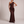 Cecily one shoulder satin maxi dress in Brown on a light gray studio backdrop