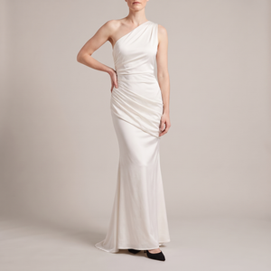 Cecily one shoulder satin maxi dress in White on a light gray studio backdrop