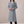 Celeste long wool coat in Gray on a light gray studio backdrop