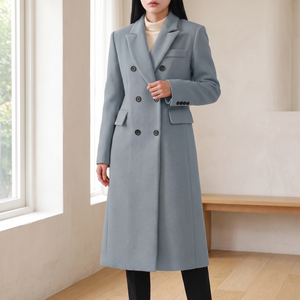 Woman by a window in the Gray Celeste long wool coat, buttoned
