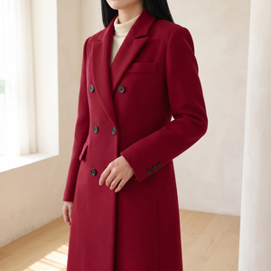 Close view of the Red Celeste coat flap pocket, chest welt pocket and buttoned cuff