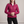 Clementine quilted down jacket in Fuchsia on a light gray studio backdrop