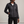 Clementine quilted down jacket in Black on a light gray studio backdrop