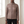 Close view of the Clementine quilted down jacket in Taupe showing the front zip, quilting and zipped side pocket