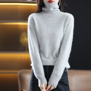 Cressida cashmere turtleneck sweater in Gray worn with jeans