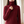 Close view of the folded ribbed turtleneck and ribbed cuff of the Cressida cashmere turtleneck sweater in Dark Red