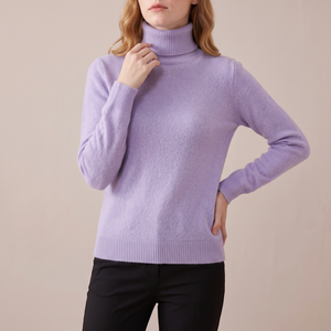 Cressida cashmere turtleneck sweater in Lavender on a light gray studio backdrop