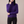 Cressida cashmere turtleneck sweater in Purple on a light gray studio backdrop