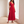 Cristina pleated maxi dress in Red, full length by a tall window