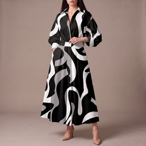 Eliza maxi shirt dress in Black Wave Print on a light gray studio backdrop