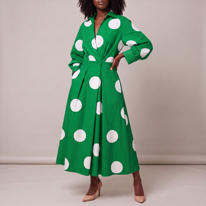 Eliza maxi shirt dress in Green Polka Dot on a light gray studio backdrop
