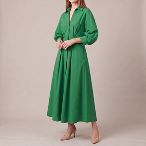 Eliza maxi shirt dress in Green on a light gray studio backdrop