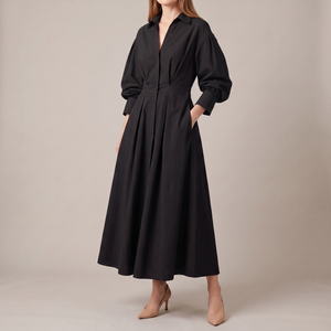 Eliza maxi shirt dress in Black on a light gray studio backdrop