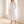 Eliza maxi shirt dress in White by a window in a bright room