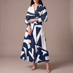 Eliza maxi shirt dress in Navy Geometric Print on a light gray studio backdrop