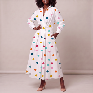 Eliza maxi shirt dress in Rainbow Polka Dot on a light gray studio backdrop