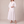 Eliza maxi shirt dress in White on a light gray studio backdrop
