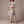 Eliza maxi shirt dress in Yellow Newspaper Print on a light gray studio backdrop