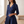 Close view of the Navy Blue Eloise dress shawl collar, wrap V neckline and gathered bodice