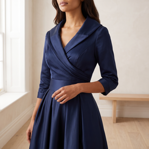 Close view of the Navy Blue Eloise dress shawl collar, wrap V neckline and gathered bodice