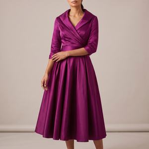 Eloise wrap midi dress in Purple on a light gray studio backdrop