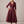 Eloise wrap midi dress in Wine on a light gray studio backdrop