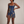 Elsie butterfly sequin mini dress in Navy Blue on a light gray studio backdrop