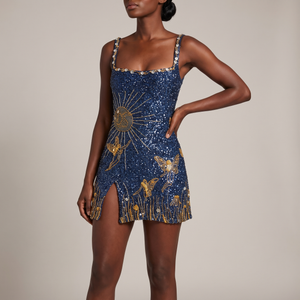 Elsie butterfly sequin mini dress in Navy Blue on a light gray studio backdrop