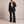 Eudora blazer and wide leg pants set in Black on a light gray studio backdrop