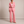 Eudora blazer and wide leg pants set in Pink on a light gray studio backdrop
