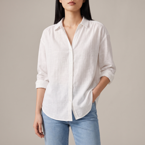 Francesca linen blend button down shirt in White on a light gray studio backdrop
