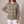 Francine plaid button front cardigan in Khaki on a light gray studio backdrop