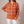 Francine plaid button front cardigan in Orange on a light gray studio backdrop