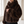 Close view of the Georgina faux fur hoodie sleeve gathered at the wrist and the long fur pile