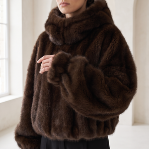 Close view of the Georgina faux fur hoodie sleeve gathered at the wrist and the long fur pile